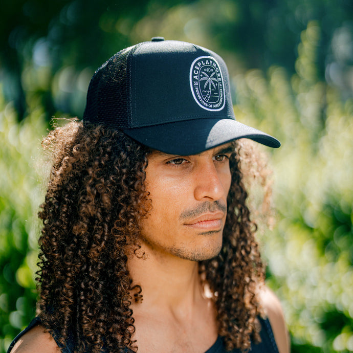 PURVEYOR Black Trucker Hat
